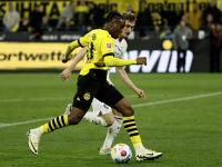 多特蒙德球员全力以赴，力争取得胜利的简单介绍